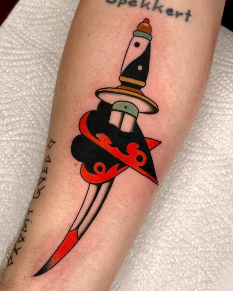 Traditional dagger tattoo by @gk._tattoo