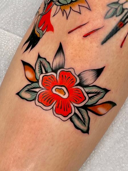 Traditional traditional flower tattoo by @gk._tattoo