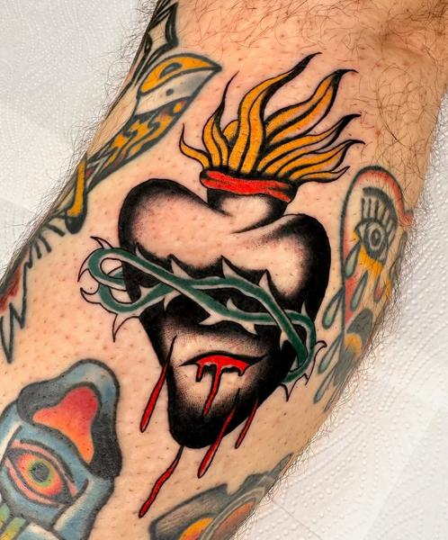 Traditional sacred heart tattoo by @gk._tattoo