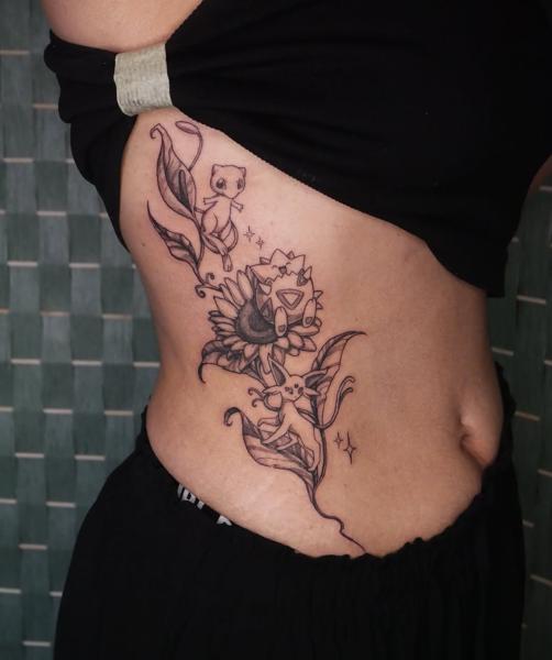 Anime pokemon sunflower tattoo by @angiek.tattoo