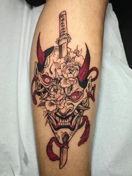 Japanese illustrative hannya mask flowers tattoo by @angelo.oxblood