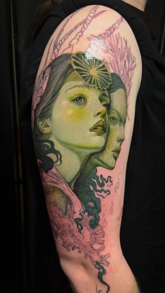 Realism dual face tattoo by @aimeecornwelltattoo