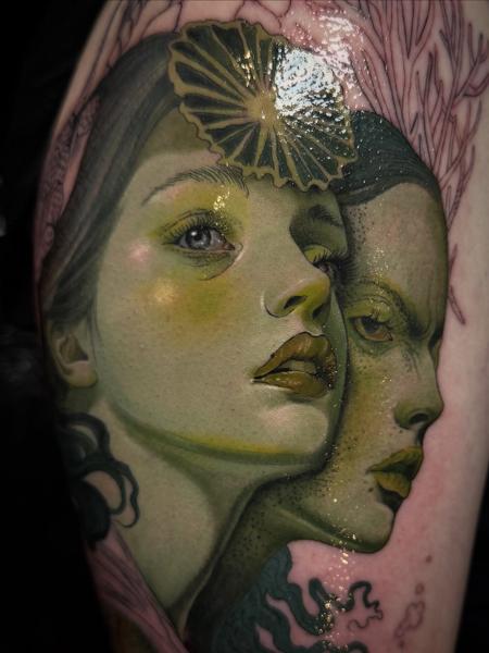Realism dual faces tattoo by @aimeecornwelltattoo