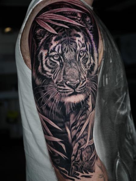Realism tiger portrait tattoo by @akuznecovas_tattoo