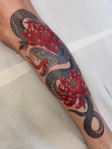 Japanese snake and flowers tattoo by @al_pomeroy