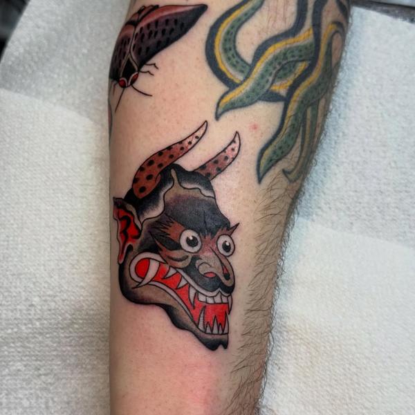 Traditional oni mask tattoo by @alberto_sagripanti