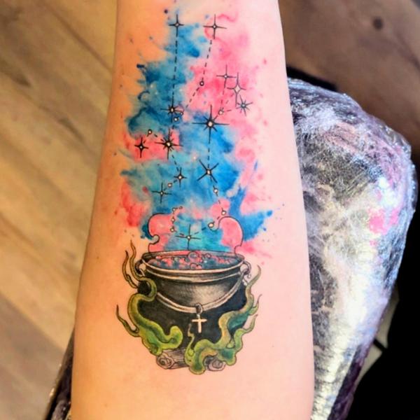 Illustrative cauldron and stars tattoo by @aleksgtattooart