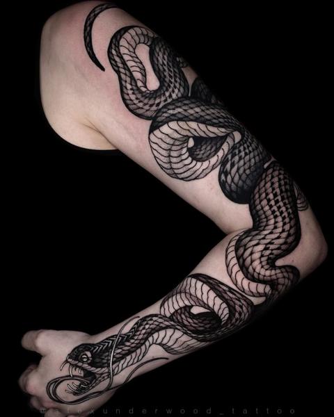 Blackwork snake tattoo by @alexunderwood_tattoo