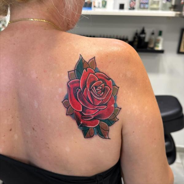 Traditional traditional rose tattoo by @christinis_inkaholic