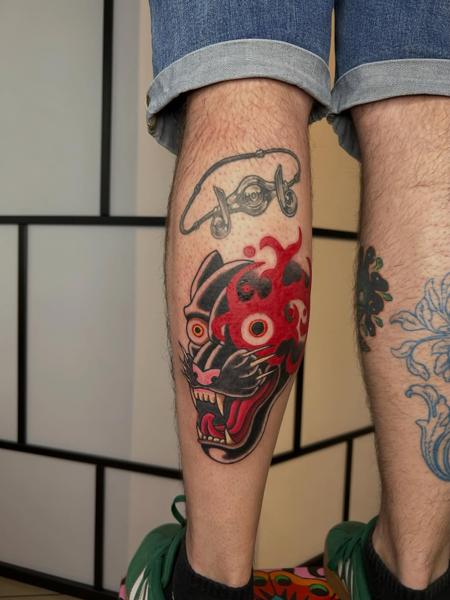 Traditional flaming panther tattoo by @antzas.ttt