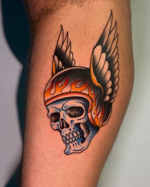 Traditional winged flaming skull tattoo by @_.aleek