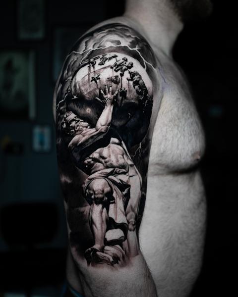 Realism atlas sculpture tattoo by @alx.tattooart