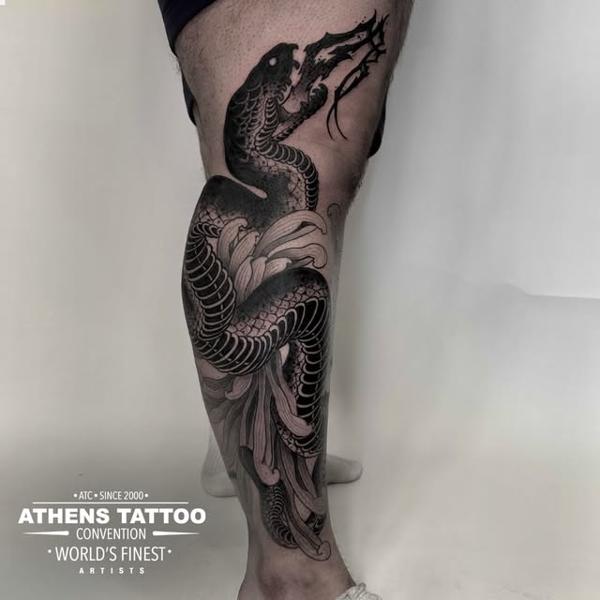 Blackwork snake and flower tattoo by @alexgotza