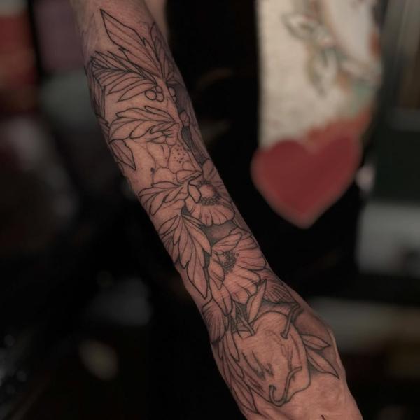 Fine line floral design tattoo by @al_xlatattoos