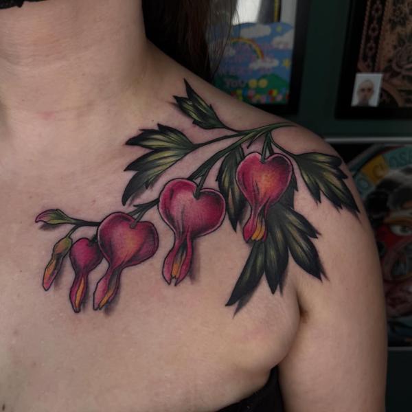 Realism bleeding heart flowers tattoo by @al_xlatattoos