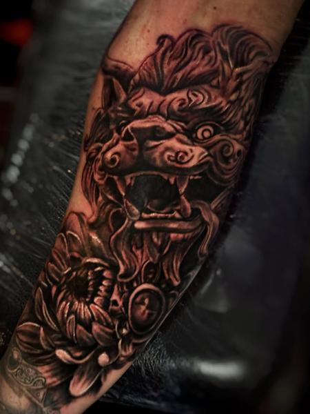 Realism foo dog tattoo by @ao.tattoos