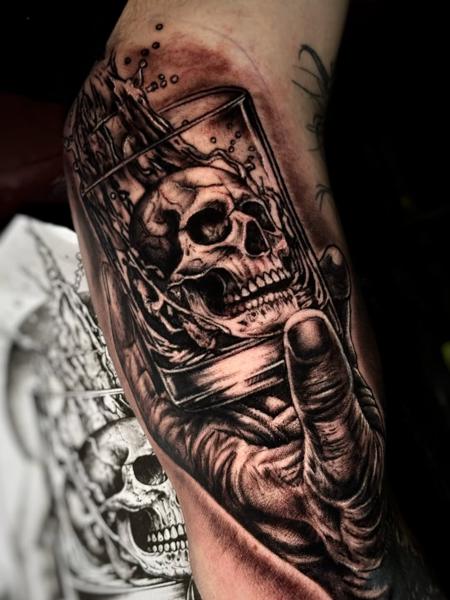 Realism skull in glass tattoo by @ao.tattoos