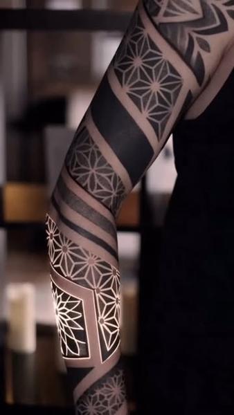 Blackwork geometric geometric patterns tattoo by @nero.prenta