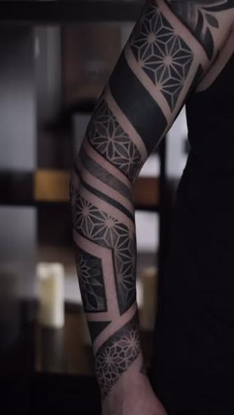 Blackwork geometric patterns tattoo by @nero.prenta