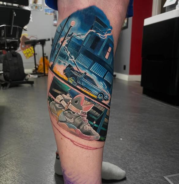 Realism delorean and sneakers tattoo by @alex_rattray_ink