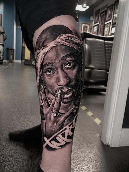 Realism portrait with bandana tattoo by @alex_rattray_ink