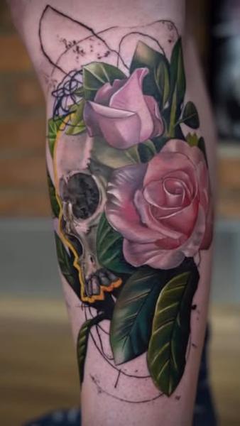 Realism floral skull tattoo by @alexsanto_tattoos