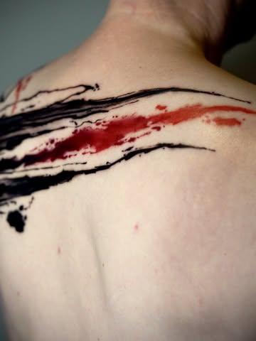Abstract abstract brushstrokes tattoo by @alexsanto_tattoos
