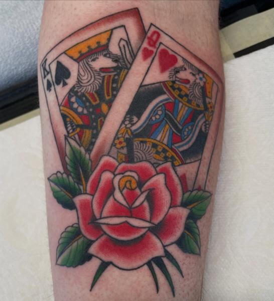 Traditional playing cards tattoo by @alexschwartztattoos