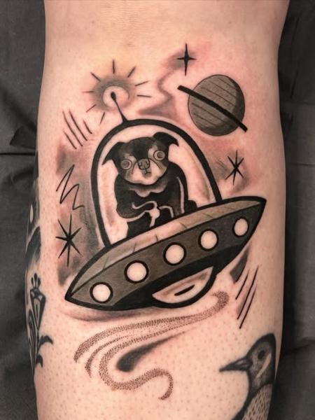 Illustrative dog in spaceship tattoo by @kelpiebat