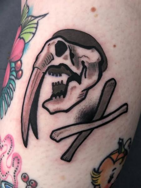 Traditional skull and bones tattoo by @kelpiebat