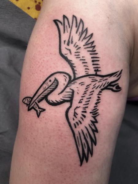 Traditional bird with fish tattoo by @kelpiebat