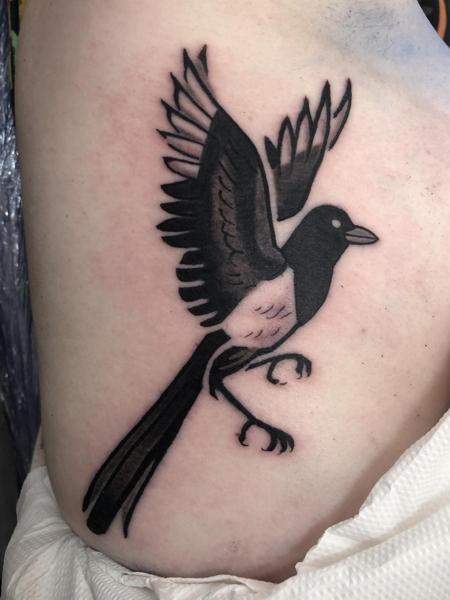 Traditional flying bird tattoo by @kelpiebat