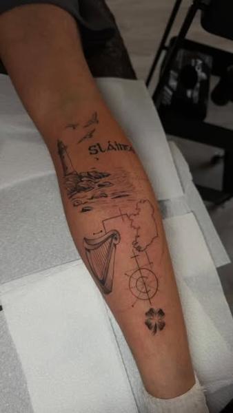 Illustrative blackwork irish symbols tattoo by @absolute.dots