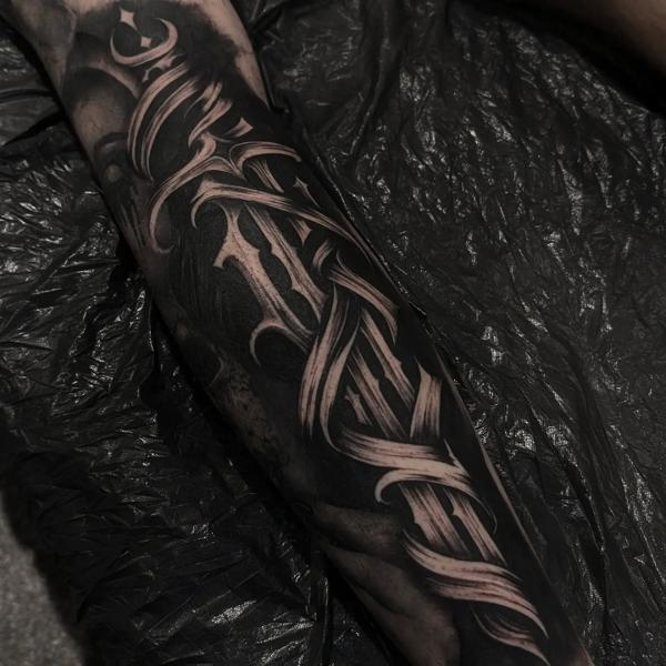 Blackwork ornamental script tattoo by @amberleena_tattoos