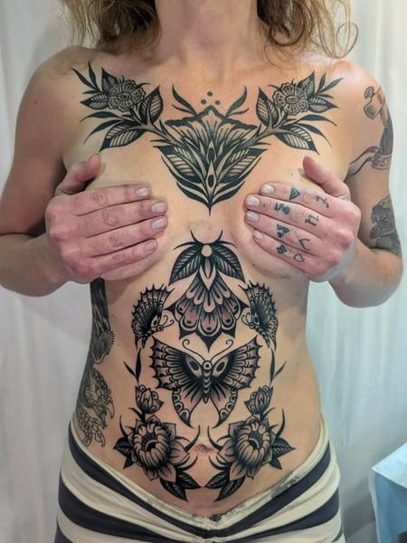Blackwork floral butterfly tattoo by @ambermoontattoo
