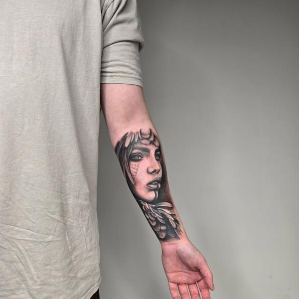 Realism tribal woman portrait tattoo by @iamscaarz