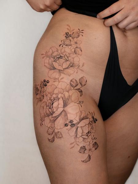 Fine line floral arrangement tattoo by @amybillingtattoo