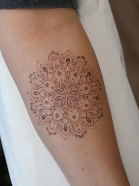 Ornamental mandala tattoo by @amybillingtattoo