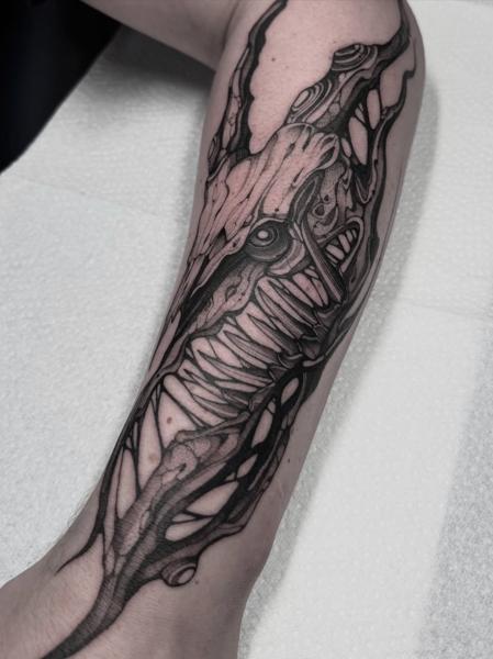 Biomechanical biomechanical design tattoo by @sitsan.barcodetattoo