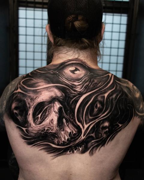 Realism abstract skull eye tattoo by @anders_grucz_tattoo