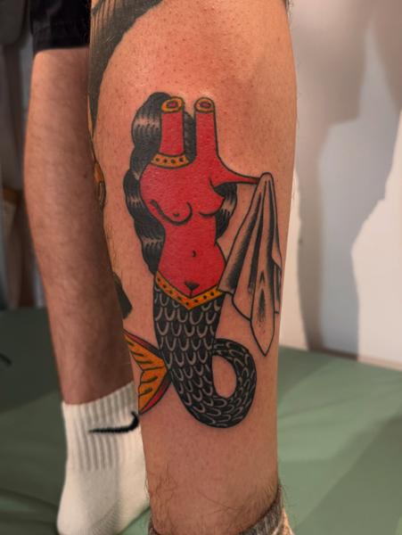 Traditional headless mermaid tattoo by @andreafurcitattoo