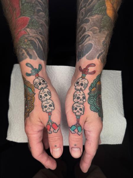 Traditional skull rope tattoo by @andreafurcitattoo