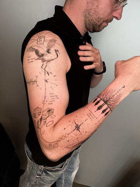 Fine line narrative crane tree tattoo by @andreas.givskov