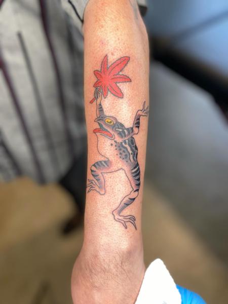 Traditional frog with leaf tattoo by @andrewkingtattoo
