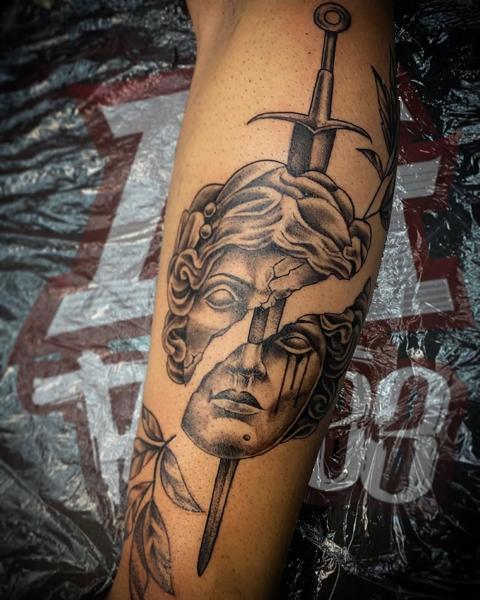 Realism cracked statue tattoo by @anduen_la23