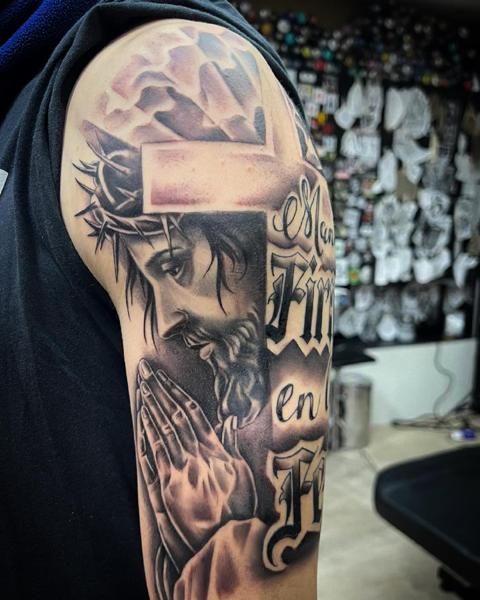 Realism praying jesus tattoo by @anduen_la23
