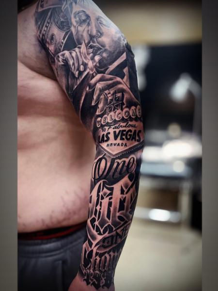 Realism las vegas sleeve tattoo by @anduen_la23