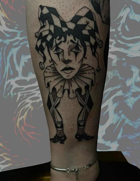 Blackwork sad jester tattoo by @andyyy_ts
