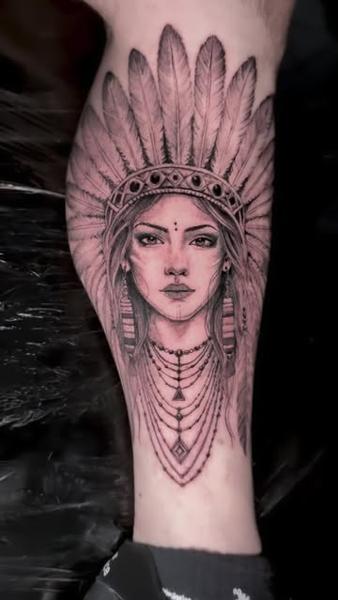Realism feathered woman portrait tattoo by @angelaltilar_tattoo