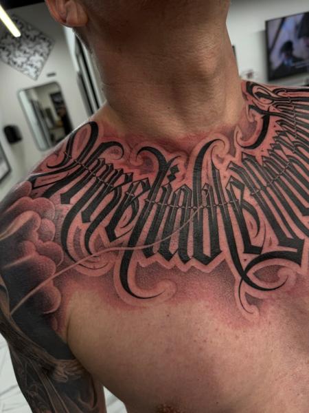 Blackwork lettering tattoo by @angelstat2